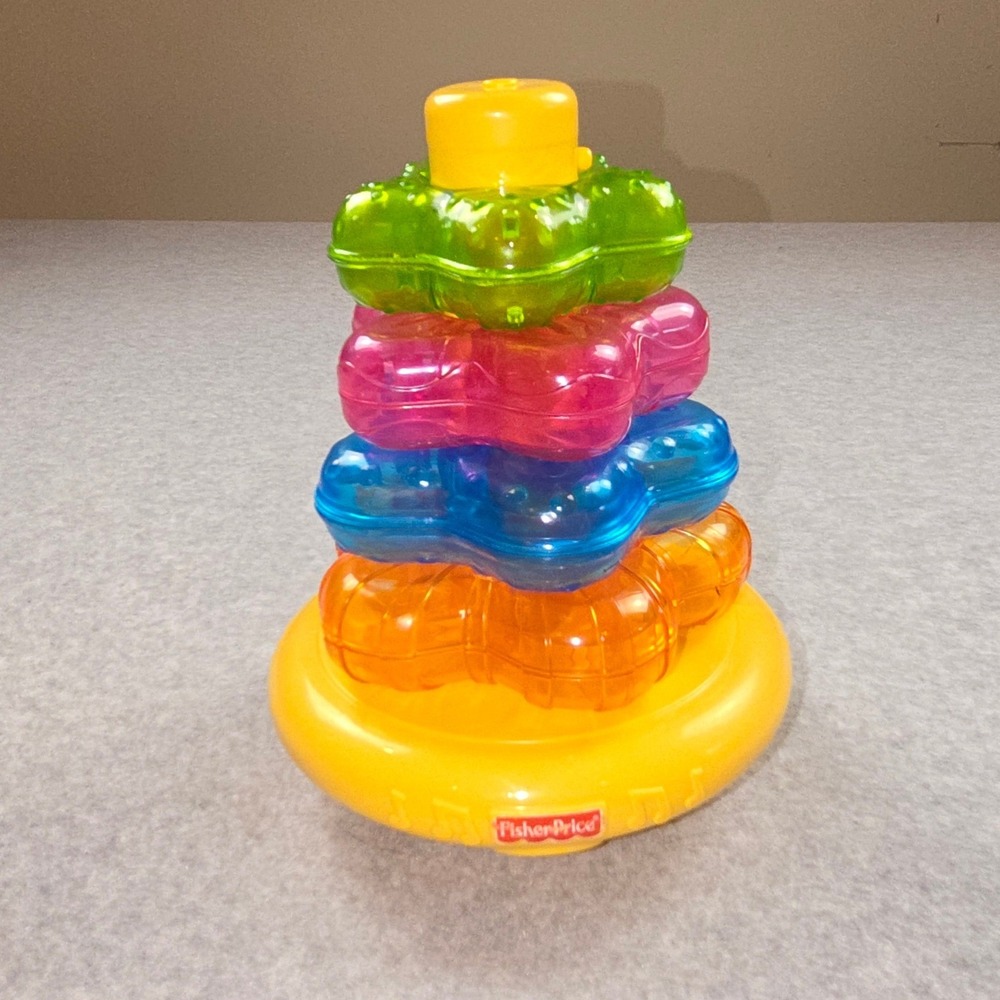 Fisher-Price Brilliant Basics Star Stacker Musical Light-Up Toy Wobbly Base